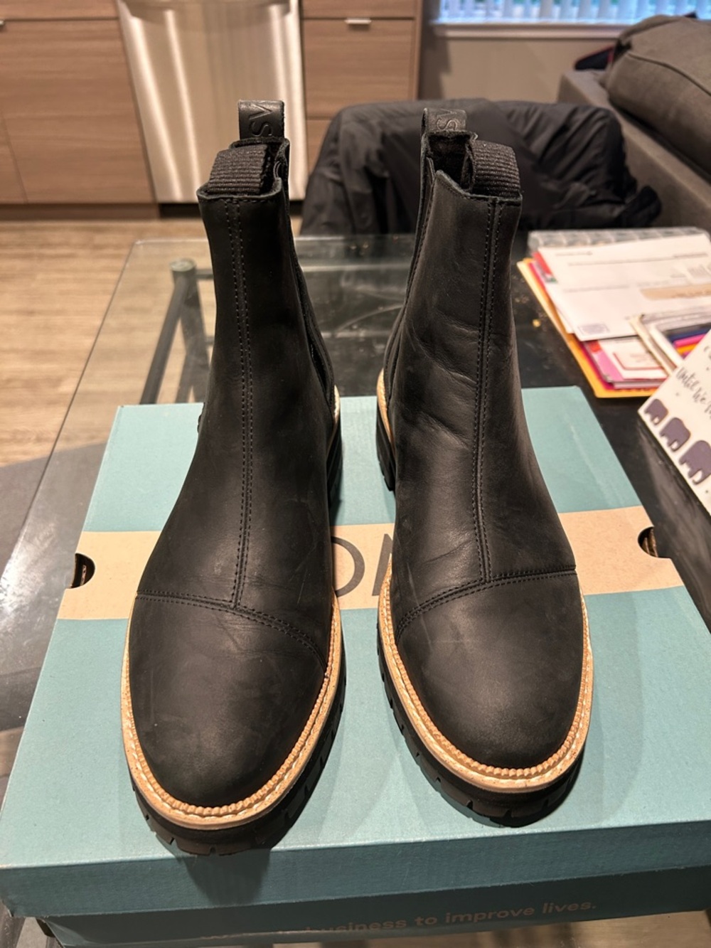 Toms Black Leather Chelsea Booties with Tan Welt Trim